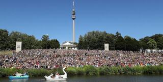 huge crowd of people outside playing Pokemon GO in Germany